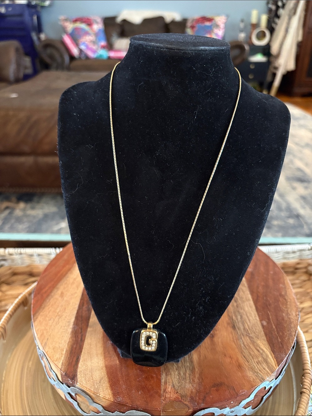 Givenchy Black Pendant Necklace with Gold 'G' Accent